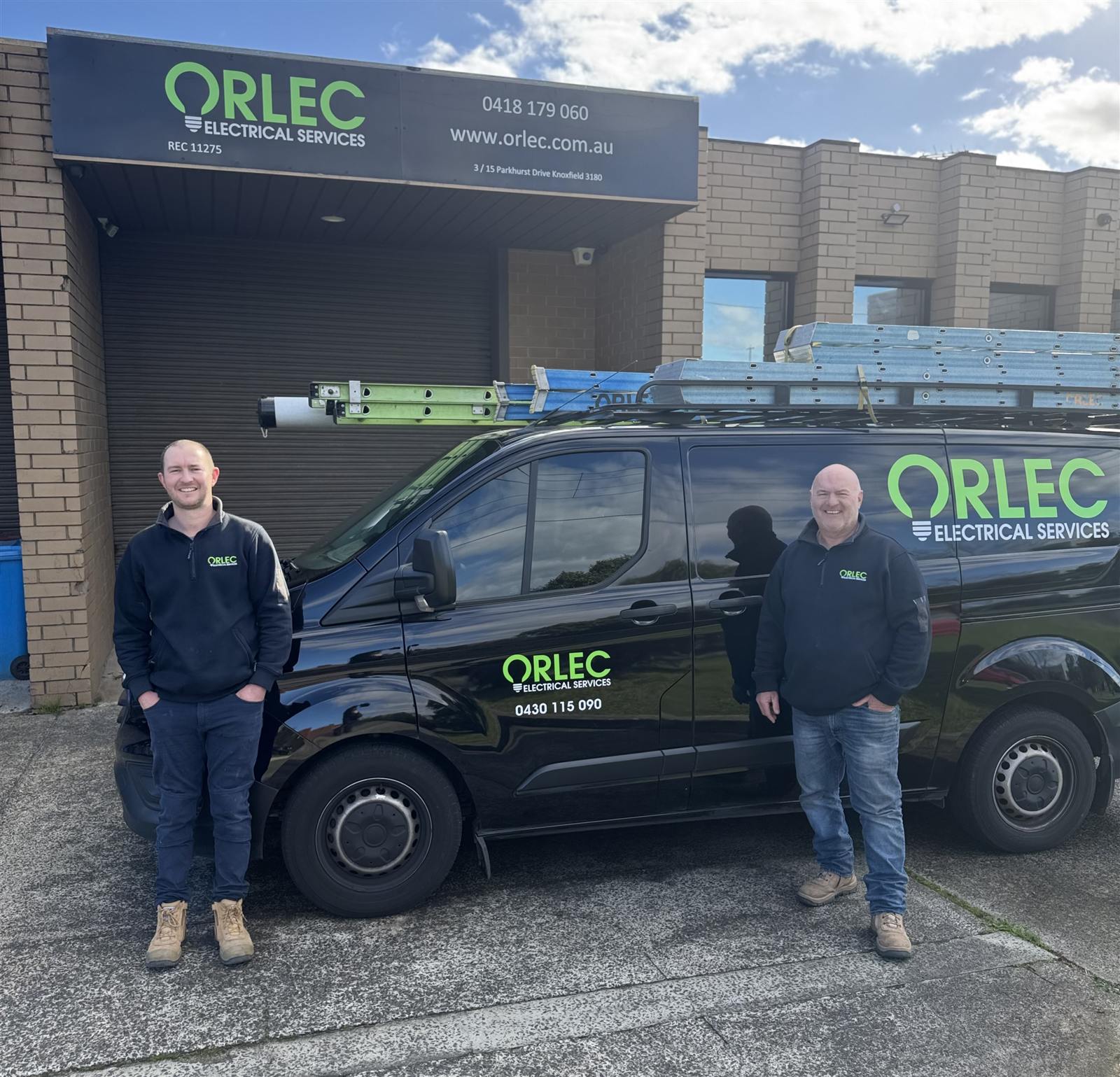Luke Orwin and Brad, Managing Directors, Orlec Electrical Services, with the Orlec service van